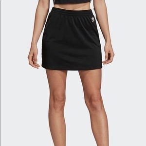 Adidas black skirt snap button sides
